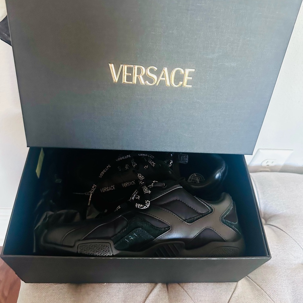 Brand New Versace Black Sneakers with the receipt, got as a gift cannot return.